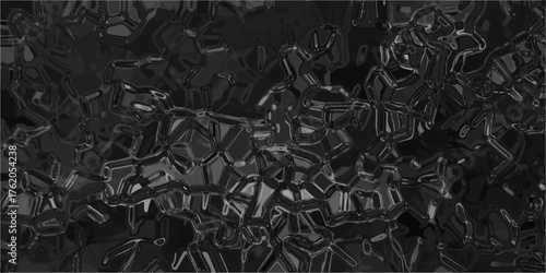 Textured abstract background in grayscale with a mosaic of angular, crystalline shapes and varying shades of gray, suggesting a mineral or geological formation