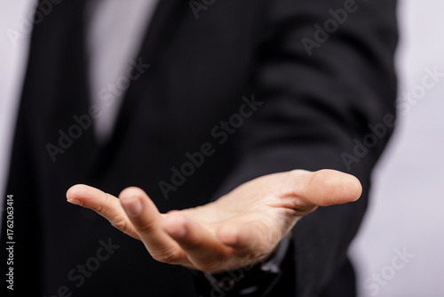 A businessman's open hand, ...