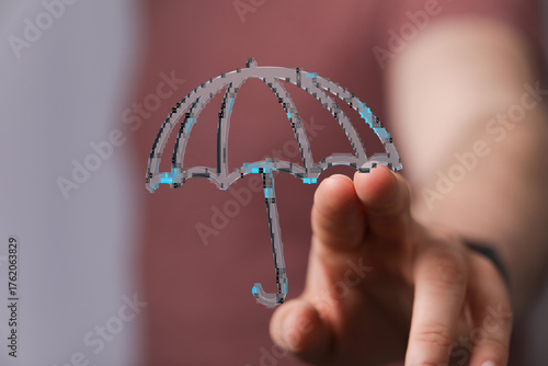 A person's finger touches a...