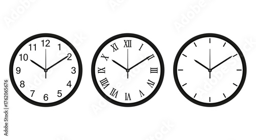 A set of three round analog clocks with Arabic, Roman, and no numerals, all showing the same time.