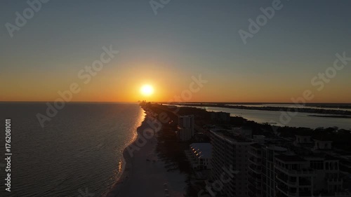 Sunset on beach with wide drone shot