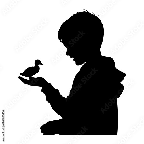 Boy holding duckling silhouette child