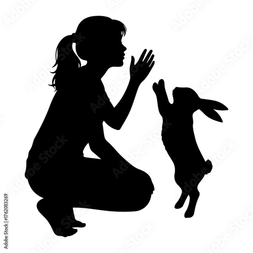 Girl playing with rabbit silhouette interaction