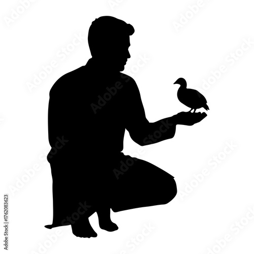 Man holding bird silhouette person crouching