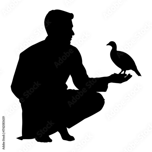 Man holding bird silhouette hand
