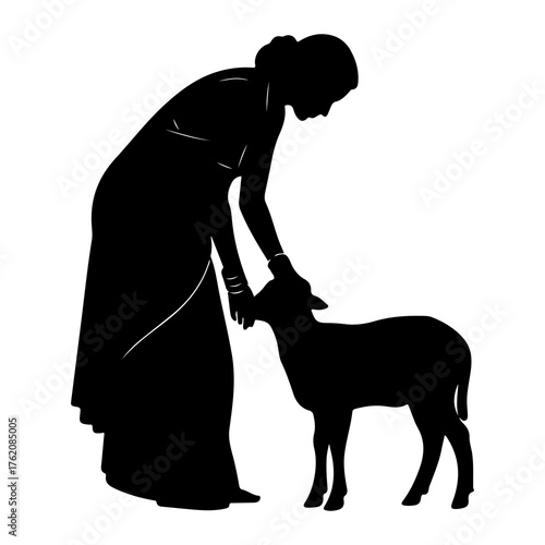 Woman petting young sheep silhouette child