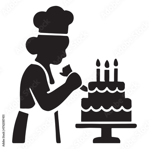 Baker decorating birthday cake silhouette