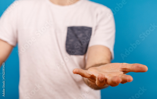 A man extending his open pa...