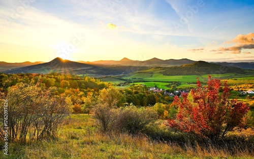 Sunset over the Bohemian Central Mountains. A beautiful view of the autumn landscape
is sought after by domestic and foreign tourists.
