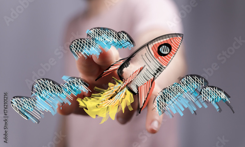 Hand holding a digitally dr...