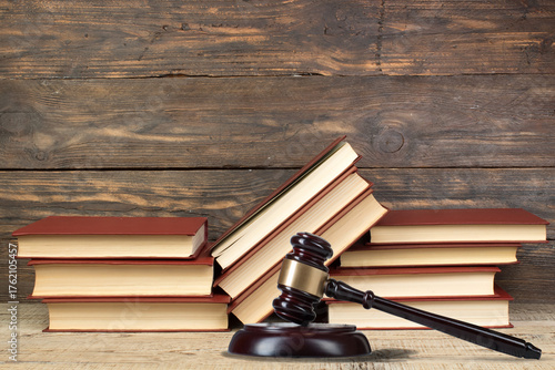 Law and Justice, Legality concept, Judge Gavel on a wooden background, Law library concept.