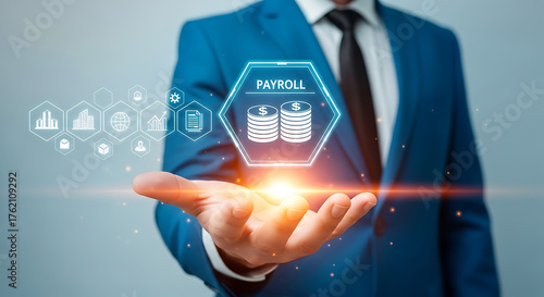 Fototapeta Naklejka Na Ścianę i Meble -  Payroll Management System Concept – Businessman Holding Digital Icon for Salary, Finance, and HR Solutions