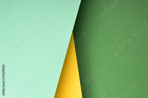 Colorful of soft pink and green paper background. Copy space for text. Top view.