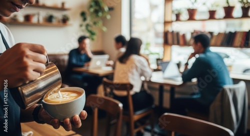 Barista carefully pours latte art foam into a ceramic cup for customer service advertising.