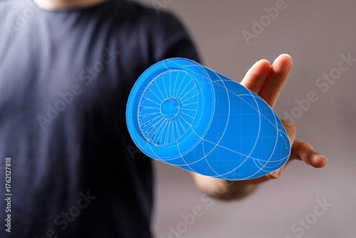 A person holding a blueprin...