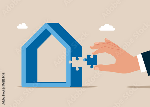 Hand holding jigsaw piece to finish a house, complete puzzle parts of house, real estate investment. Vector flat illustration
