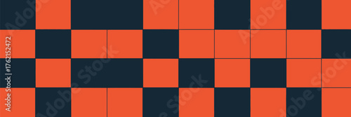 A checkerboard pattern featuring alternating squares of orange and dark blue arranged symmetrically across frame