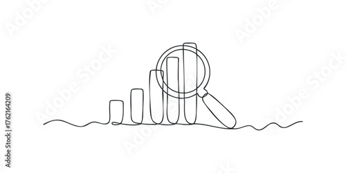 Magnifying glass over growing bar graph
