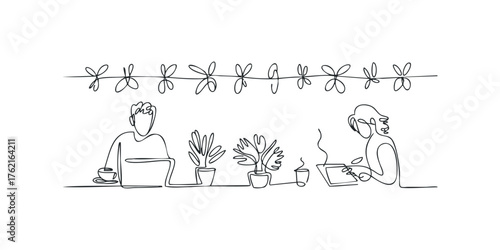 People working at desks with plants and coffee