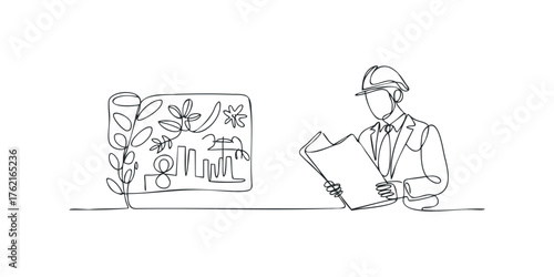 Architect reviewing plans and schematics on construction site