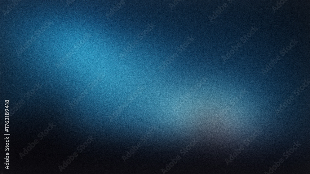 Obraz premium A mesmerizing blue textured background showcases a captivating blend of light and shadow, creating a dynamic and visually striking effect with a grainy surface and subtle gradients