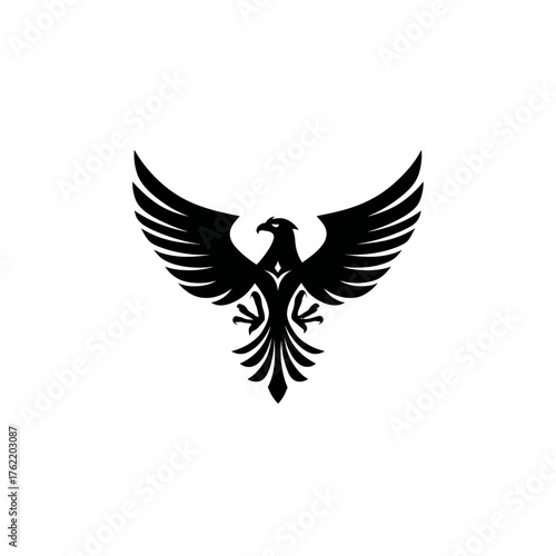 Majestic black eagle or phoenix silhouette with powerful wings spread, symbolizing strength, freedom, and soaring ambition vector.