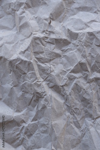 Brown crumpled recycled paper texture background. Kraft Paper