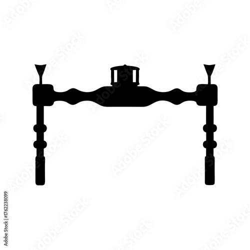 Vector illustration of a black camping stove icon for outdoor adventures