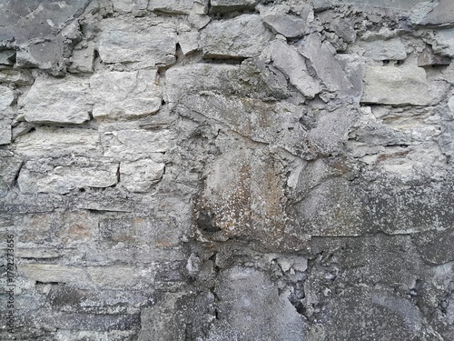 Background of very old stone wall texture photo