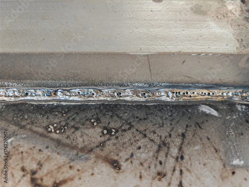 Porosity or Cluster Porosity in Welded, Defect of Welding with Process Flux Cored Arc Welding (FCAW).