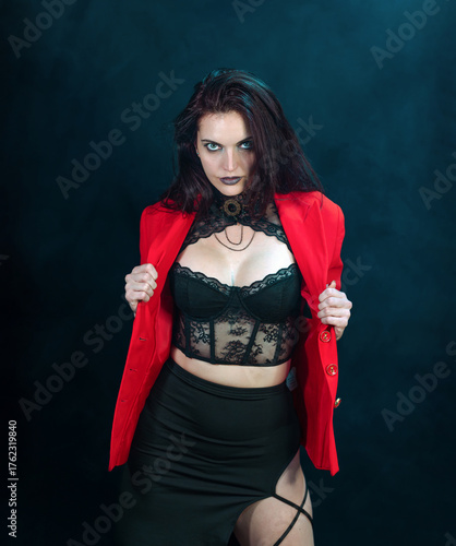 Forward-Facing Pose of a Gothic Woman in a Red Jacket, Smoky Studio Look