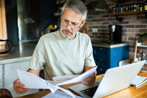 Mature man working from home office