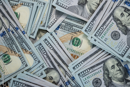 Hundred dollar banknotes background representing financial stability, banking and currency concept