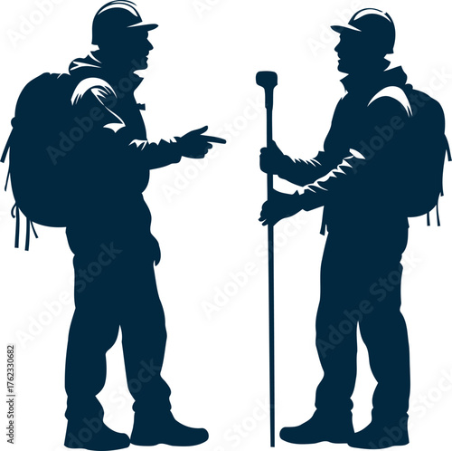 Two backpackers silhouetted standing talking outdoor adventure hikers exploring nature