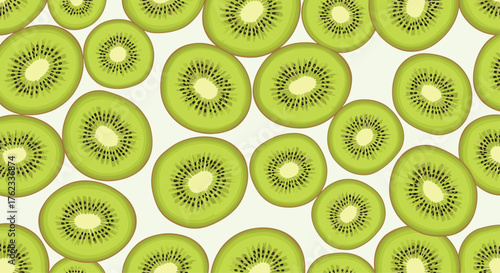 Vibrant Green Kiwi Slices Scattered on a White Background.