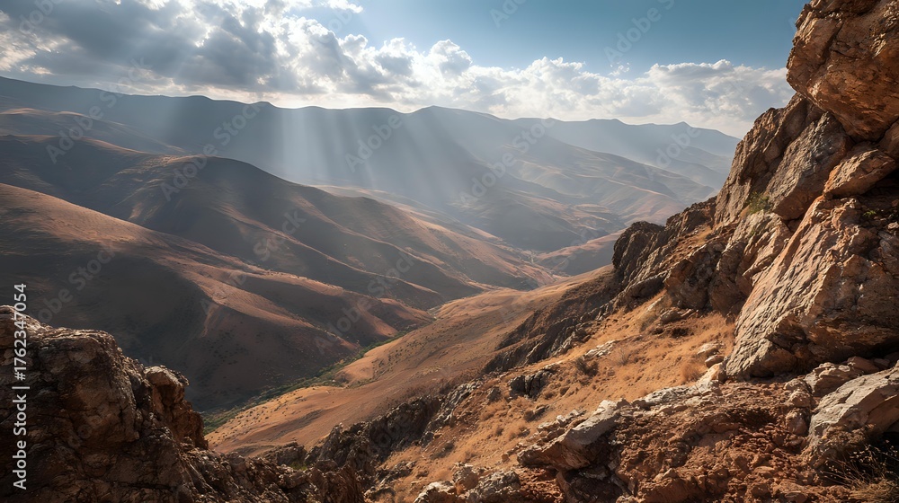 Obraz premium Mountain gorge featuring folded strata and rare mineral inclusions shining in sunlight