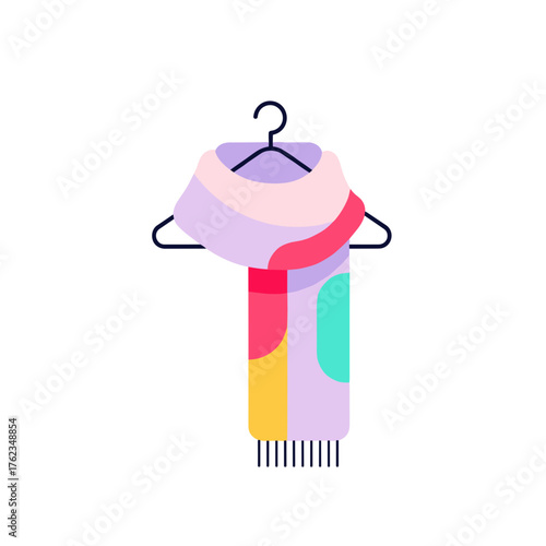 Colorful wool scarf hanging on hook in minimalist style for winter  