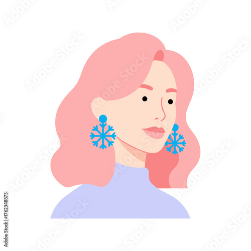 Young woman with pink hair wearing snowflake earrings in winter  