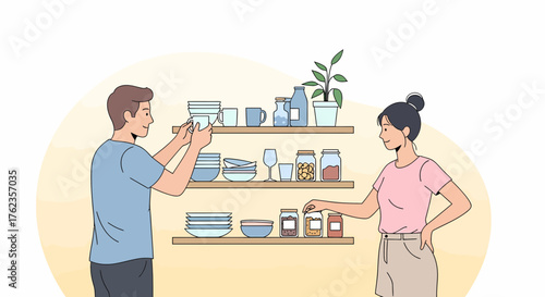 Couple Organizing Kitchen Shelves Together Storing Food And Dishes