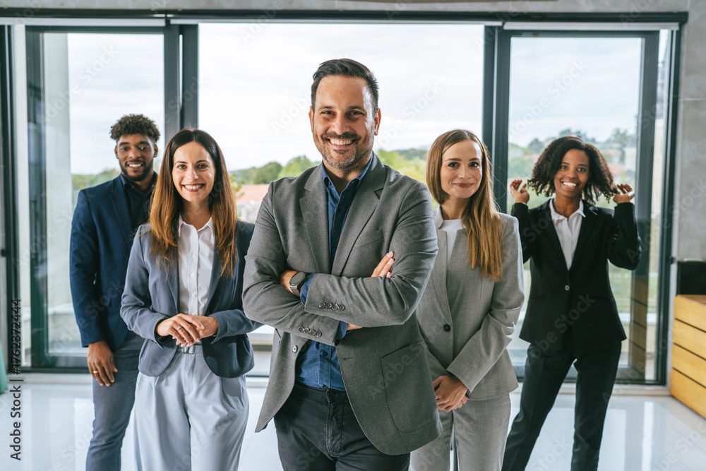 Obraz premium Diverse business team smiling standing in office