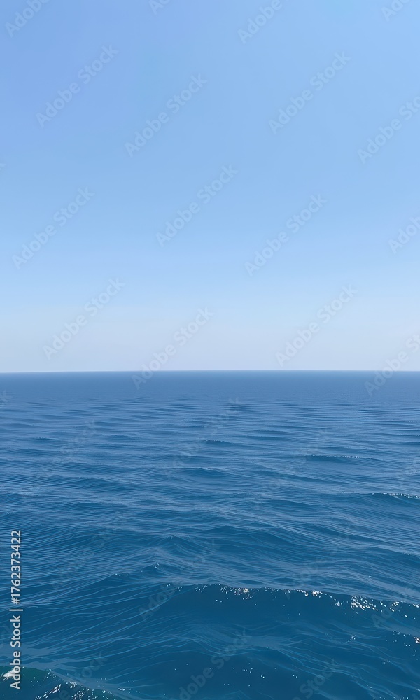 Obraz premium Vast, seamless expanse of tranquil blue sea meeting a clear, bright sky, creating a serene horizon, ocean, travel, horizon