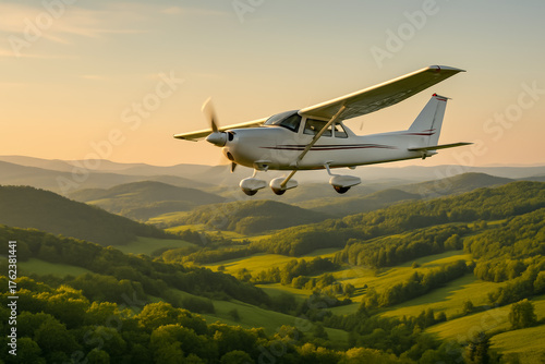 Wallpaper Mural Small airplane flying over lush green hills at sunset Torontodigital.ca