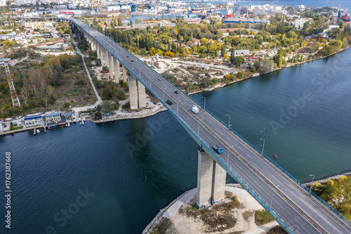 Aerial view of big bridge with cars above lake towards Varna, Bulgaria