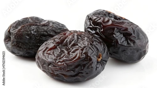 Wallpaper Mural dried prunes isolated on white background orbit video 
 Torontodigital.ca