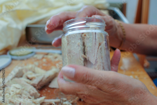 filling a glass jar with steamed bonito