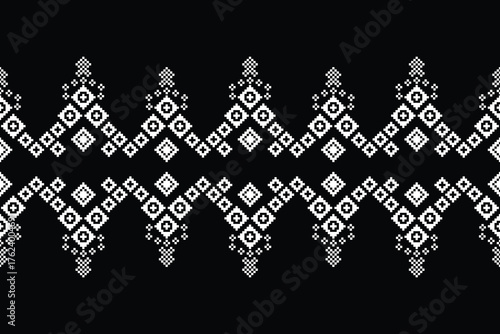 Black color background with ethnic pattern traditional motif ikat geometric fabric pattern cross stitch.Ikat embroidery oriental pixel,abstract,vector,texture art. 