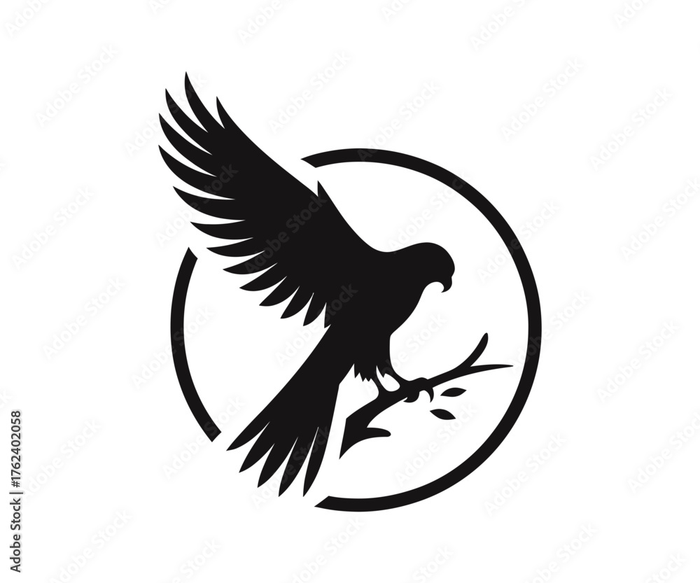 Obraz premium Silhouette of an eagle perched on a branch in circle