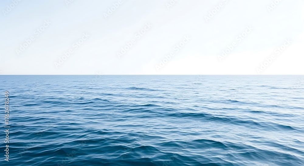 Obraz premium Vast Blue Ocean Under Clear Sky.