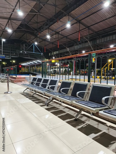 Empty Waiting Seats and Station Hall Interior