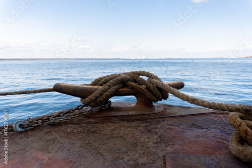 rope around a cleat on a dock